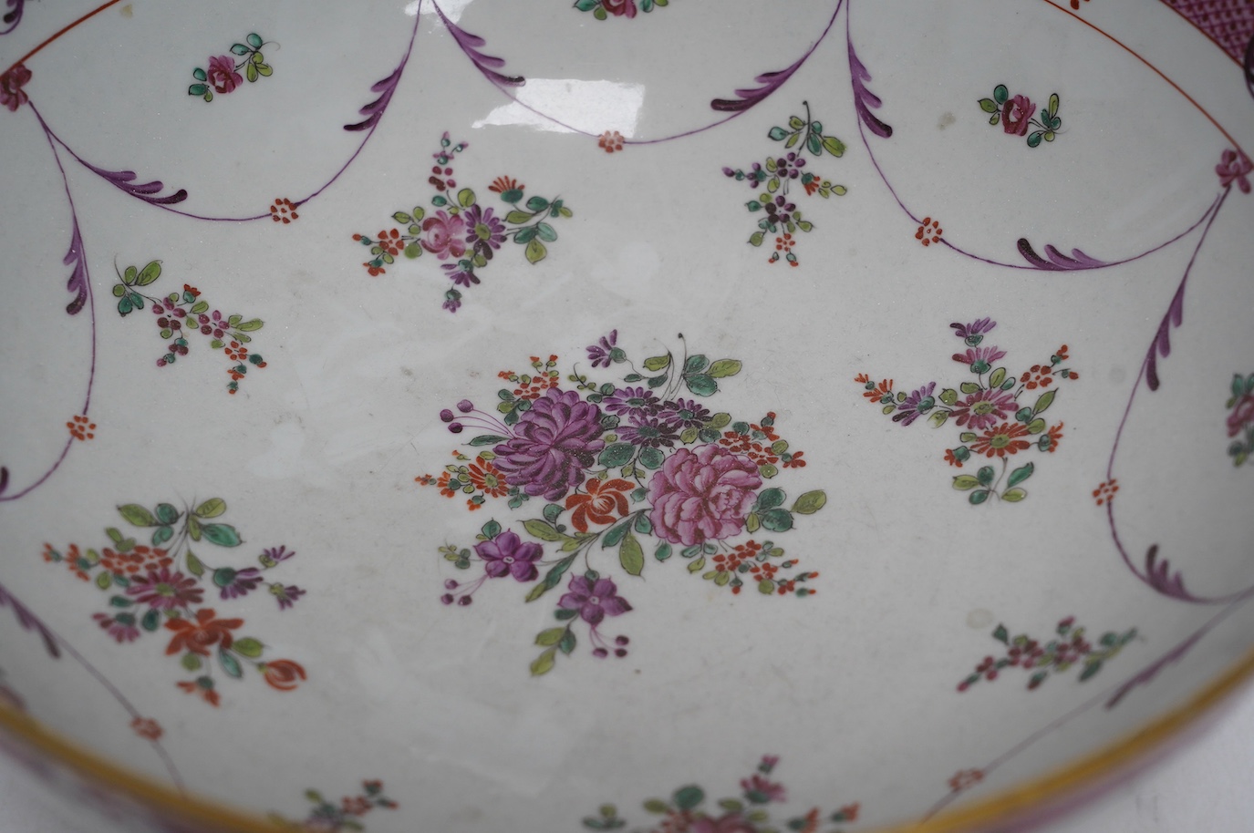 A 19th century Samson famille rose bowl, 32cm diameter. Condition - slight wear to gilding